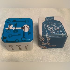 Two (2) Fossil brand tin watch boxes. New. Never used. Both are different.
